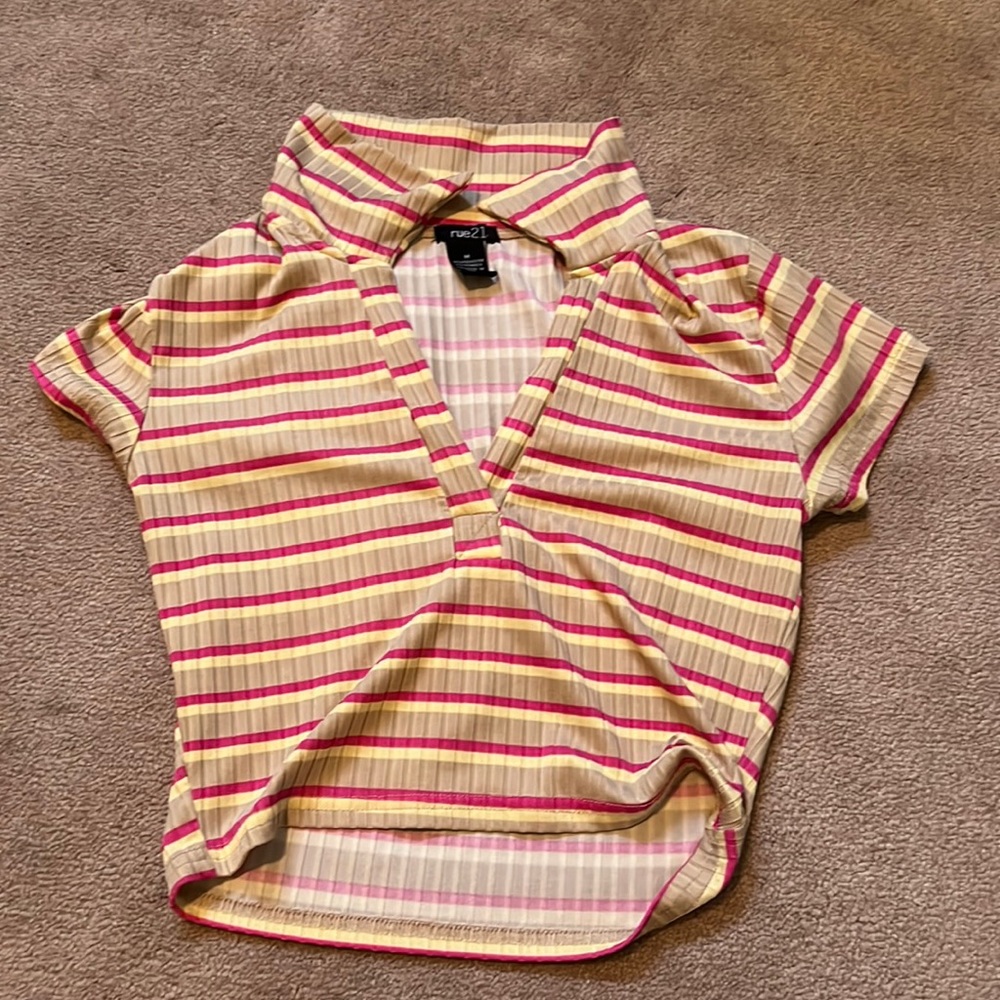 It’s a Rue21 cropped lol shirt with the striped colors of pink, yellow, and tan